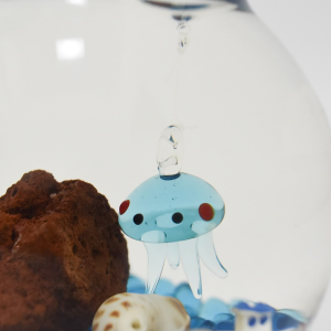 Floating glass figurine